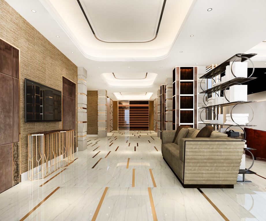 A grid of aluminum ceiling tiles with a metallic finish, featuring intricate patterns and a sleek, reflective surface, installed in a modern interior space.